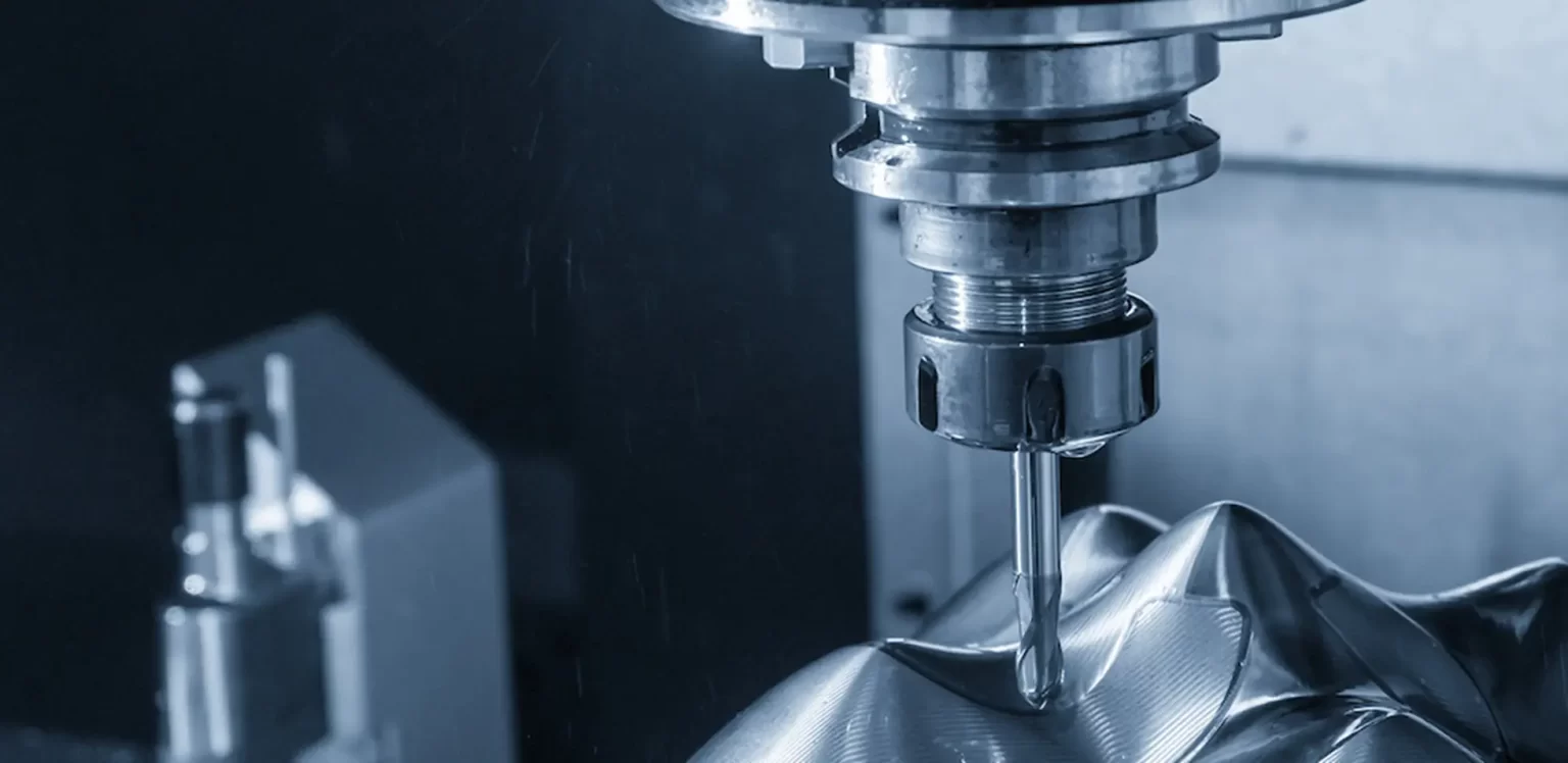 CNC milling machine manufacturing a custom mechanical component