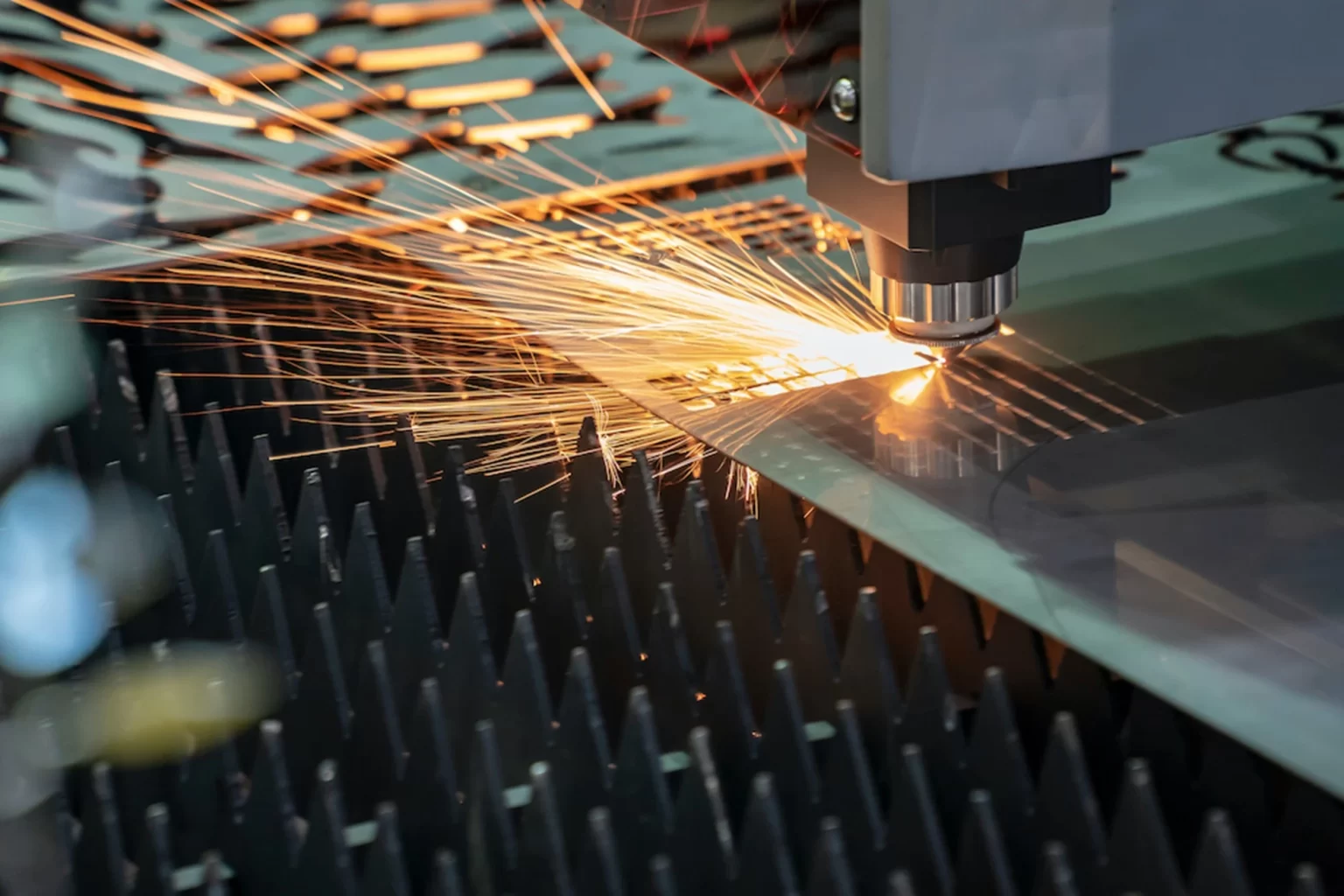 Laser cutting a sheet metal blank