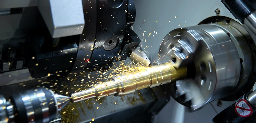 Turning operation showing a cutting tool machining a rotating workpiece